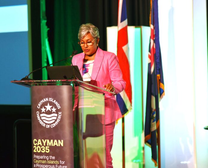 Economist Marla Dukharan addresses a sold-out Economic Forum at the Kimpton Seafire. - Photo: Supplied