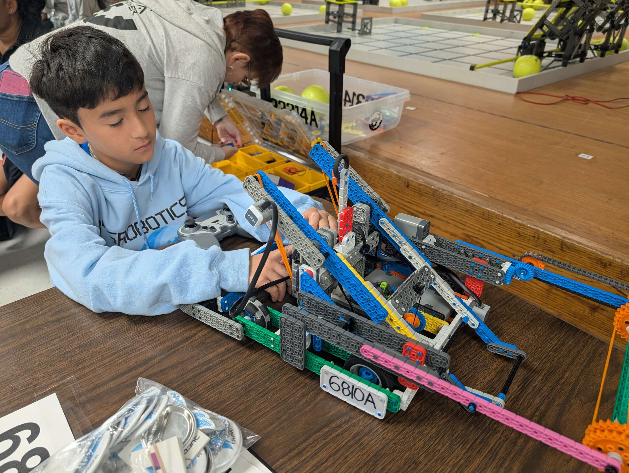 Primary school student Kai Latif with his team robot