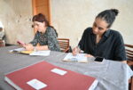 Last-minute voter applications pour into Elections Office Voters Anna Karina McDermot, left, and Brandi Hurlstone got registered on Wednesday to vote in the 30 April general election. - Photo: Reshma Ragoonath