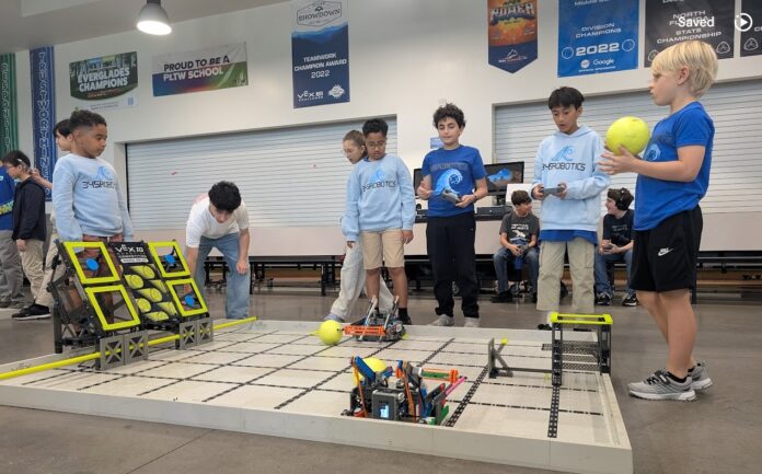 Members of 345Robotics competing in Florida