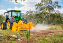 Crushing it: Beacon Farms machinery creates arable land for local farmers Beacon Farms' rock crusher at work. - Photo: Taneos Ramsay