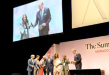 Dart given prestigious international hospitality award The Dart delegation accepts the award in Monaco. - Photo: Supplied