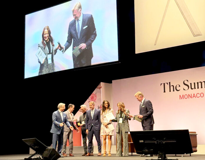 The Dart delegation accepts the award in Monaco. - Photo: Supplied