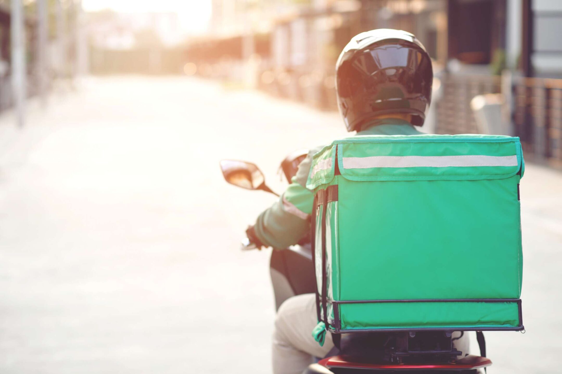 Delivery drivers on motorbike