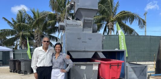 Frank Flowers and Dara Flowers Burke at the return of glass recycling on Grand Cayman