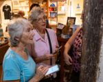 National Museum embarks on new, multilingual era of storytelling Residents try out the National Museum's new multilingual audio guide. - Photo: Cayman Islands National Museum