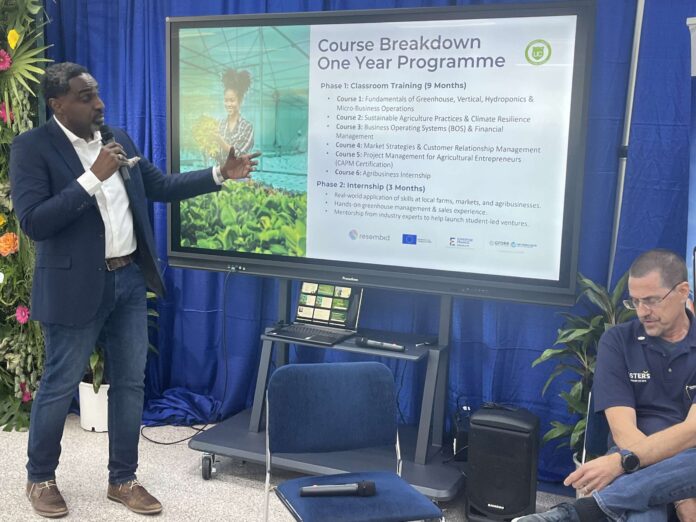 Cleveland Julien, UCCI's STEM and health programme manager, presents at the Sustainability Symposium. - Photo: Simon Boxall