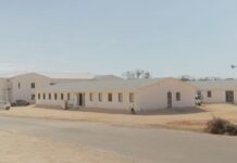 Housing block for Brac school construction workers opens