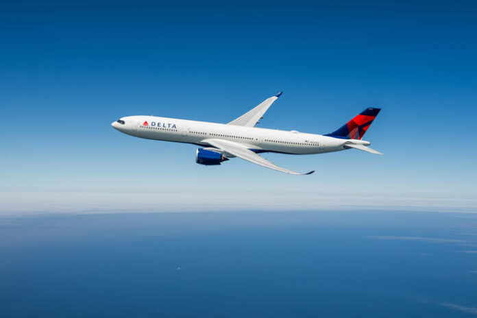 Delta plane Delta Air Lines is to resume winter flights between Detroit and Grand Cayman