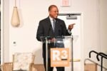 Premier: Non-profits play critical role in Cayman’s economy Premier André Ebanks speaks at an R3 Foundation conference at Hotel Indigo in George Town. - Photo: