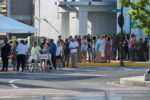 Cayman’s voter turnout is among the world’s highest Cayman voters queue on Election Day.