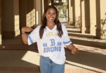 Former Caymanian gymnast becomes UCLA cheerleader UCLA cheerleader jaiden gilbert