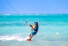 Jack, Cayman’s kitesurfing dog, catches waves Jack and his owner David Blumenthal enjoy a kitesurfing ride. - Photo: Supplied