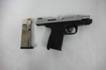 Two appear in court for firearm and drug charges Police shared this image of a recovered Smith & Wesson firearm.