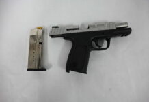 Two appear in court for firearm and drug charges Police shared this image of a recovered Smith & Wesson firearm.