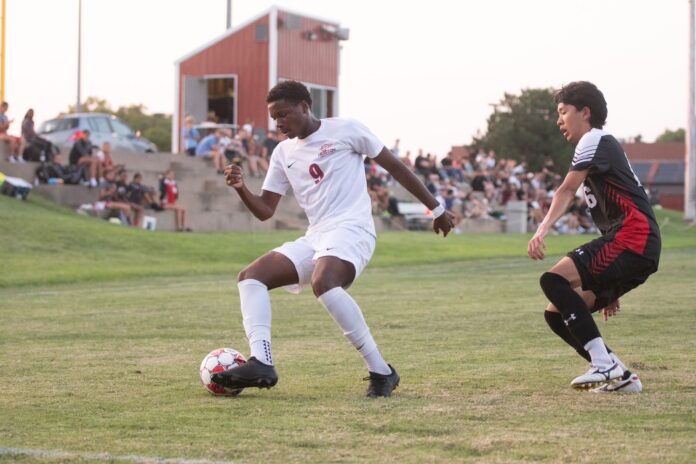 tyler beckford cayman football, Hesston College in Kansas