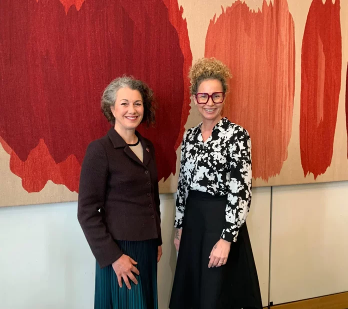 Sarah Champion, left, the new chairwoman of the Cayman Islands All-Party Parliamentary Group, poses with Tasha Ebanks Garcia, head of the Cayman London office. - Photo: Supplied