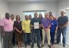 Coalition government forms with André Ebanks to be premier André Ebanks flanked by the three other elected members of The Caymanian Community Party, four from the Cayman Islands National Party, and independents Rolston Anglin, Isaac Rankine, and Jay Ebanks. - Photo: Submitted