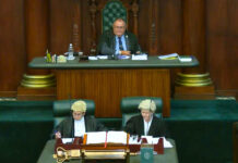 New MPs get straight to work in Parliament Speaker of Parliament Ezzard Miller overseeing Wednesday's meeting of the House. - Photo: CIG TV