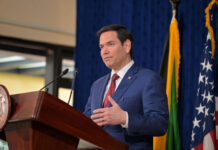US social media vetting pauses Cayman student visa interviews Cayman students