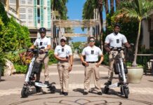 Camana Bay security officers to wear bodycams Members of the Camana Bay security team display their body-worn cameras. - Photo: Supplied
