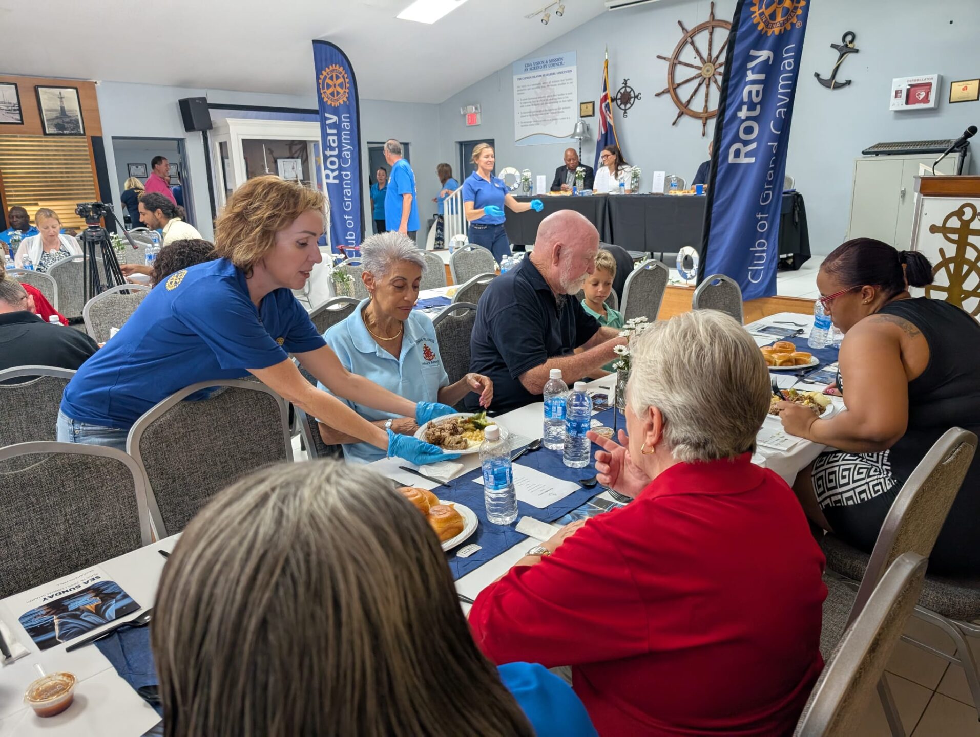 The Rotary Club of Grand Cayman provided lunch of jerk chicken, Cayman-style beef, mac 'n cheese and banana cake dessert. The Rotary Club of Grand Cayman provided lunch of jerk chicken, Cayman-style beef, mac 'n cheese and banana cake dessert.