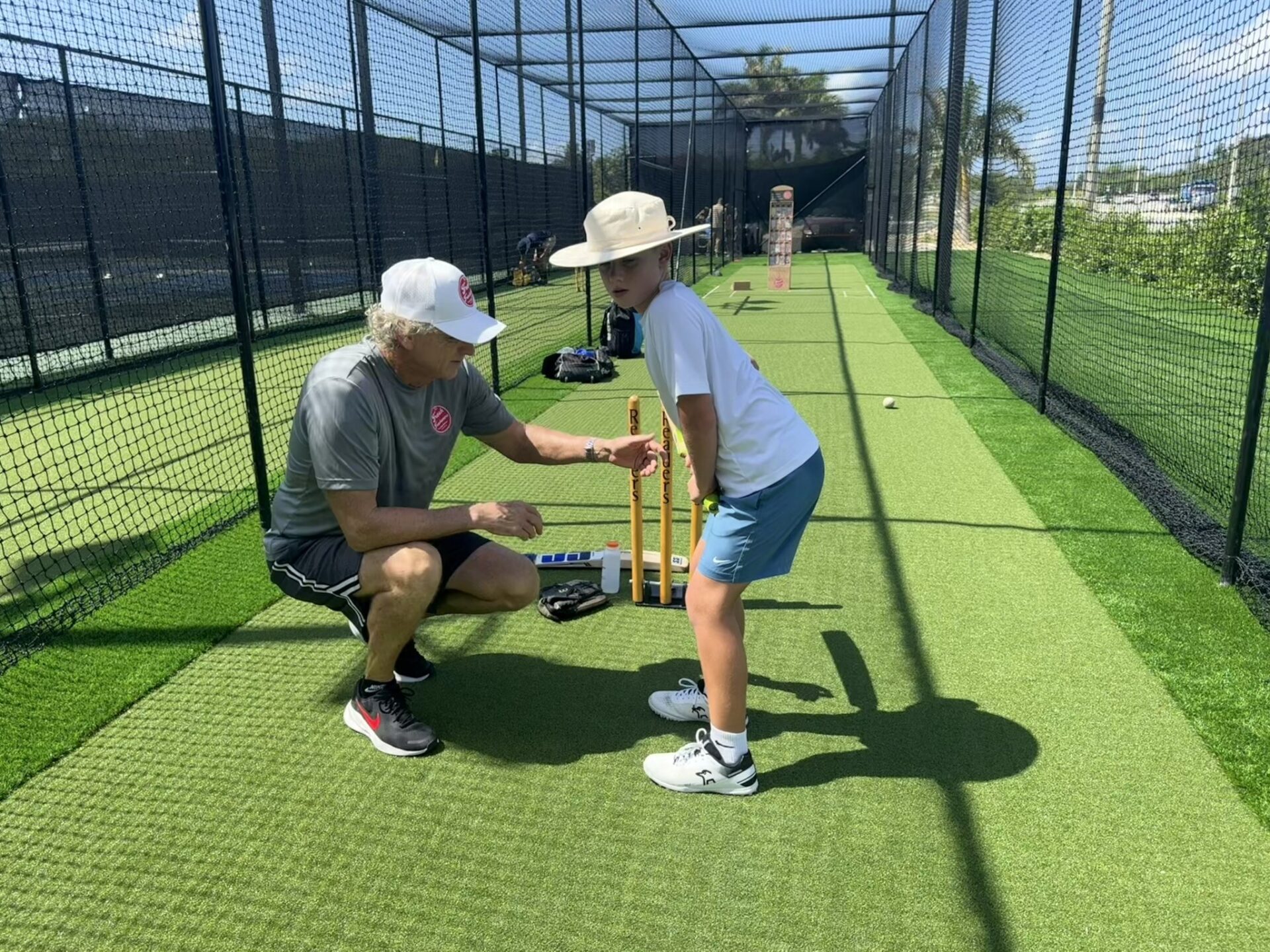 Peter Anderson coaching rising star, eight-year old Harry Lawson. - Photo: Sarah Bridge