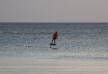 eFoil entrepreneur circles Grand Cayman in under four hours Riley Grey of Cayman eFoil travelled around Grand Cayman on a carbon-fibre motor-powered board in less than four hours