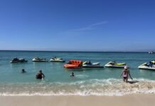 Coast Guard commandant calls for safer boating swimmers and jet skis on public beach
