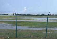 Heavy rain causes roads and airport chaos