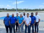 Airports Authority promotes three air traffic controllers Front row, from left, new air traffic control officers Stephen Ebanks, Lauryn Bennette and Jose Delgado, along with, back row from left, Charles Kirkconnell International Airport's Joshua Burke, Rodney Dixon, Eric Bodden and Perry Norris, and Civil Aviation Authority Cayman Islands air navigation services inspector Rob Harris - Photo: Submitted