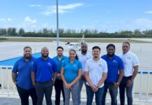 Airports Authority promotes three air traffic controllers Front row, from left, new air traffic control officers Stephen Ebanks, Lauryn Bennette and Jose Delgado, along with, back row from left, Charles Kirkconnell International Airport's Joshua Burke, Rodney Dixon, Eric Bodden and Perry Norris, and Civil Aviation Authority Cayman Islands air navigation services inspector Rob Harris - Photo: Submitted