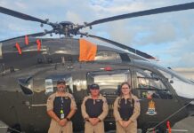 Cayman police helicopter crew helps fight crime wave in Turks and Caicos Cayman police are helping crimefighting efforts in Turks and Caicos. - Photo: Submitted