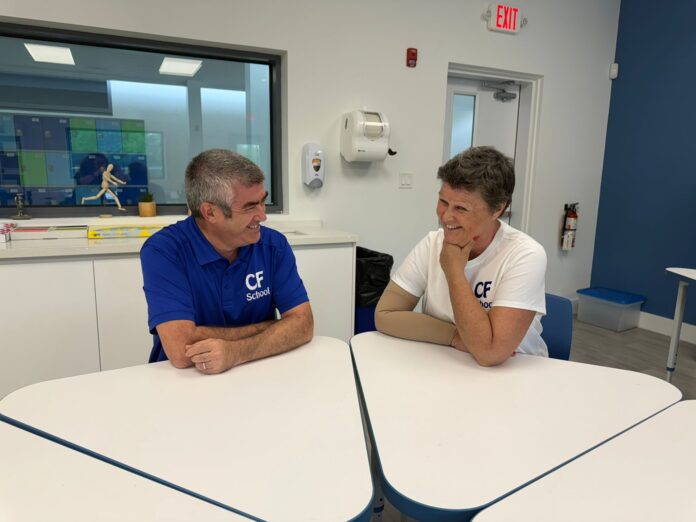 CF High School's deputy head teacher James Hickey and director Nicola Sowerby sit in one of the new school classrooms. The school will open its doors on 8 Sept. - Photos: Norma Connolly