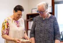 Mary Evelyn Wood’s handiwork acquired by National Museum From left, Joy Basdeo hands over two hand-crafted handbags that belonged to National Hero Mary Evelyn Wood to the National Museum. - Photo: The Cayman Islands National Museum