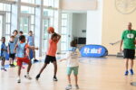 Cayman basketball campers learn from NBA player basketball camp cayman islands