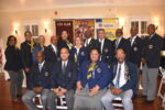 New Lions Club president aims to make a difference The new Lions Club of Grand Cayman board with President Siri Jones-Russell, seated second from right, and Immediate Past President Brian Barnes, seated right. - Photo: Submitted