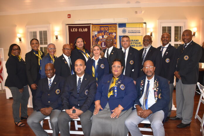 The new Lions Club of Grand Cayman board with President Siri Jones-Russell, seated second from right, and Immediate Past President Brian Barnes, seated right. - Photo: Submitted