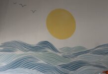 Mural delivers touch of sunshine to Cayman Food Bank