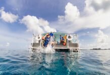 Cayman interns help divers with disabilities plunge beneath the waves