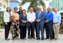 After first 100 days, government touts ambitious vision Government celebrated its first 100 days in office at an event in George Town. - Photo: Sarah Bridge