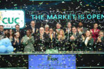 Cayman’s power firm marks 35 years on Toronto Stock Exchange CUC president and CEO Richard Hew (front, fourth from left) opens the Toronto Stock Exchange. -Photo: Supplied