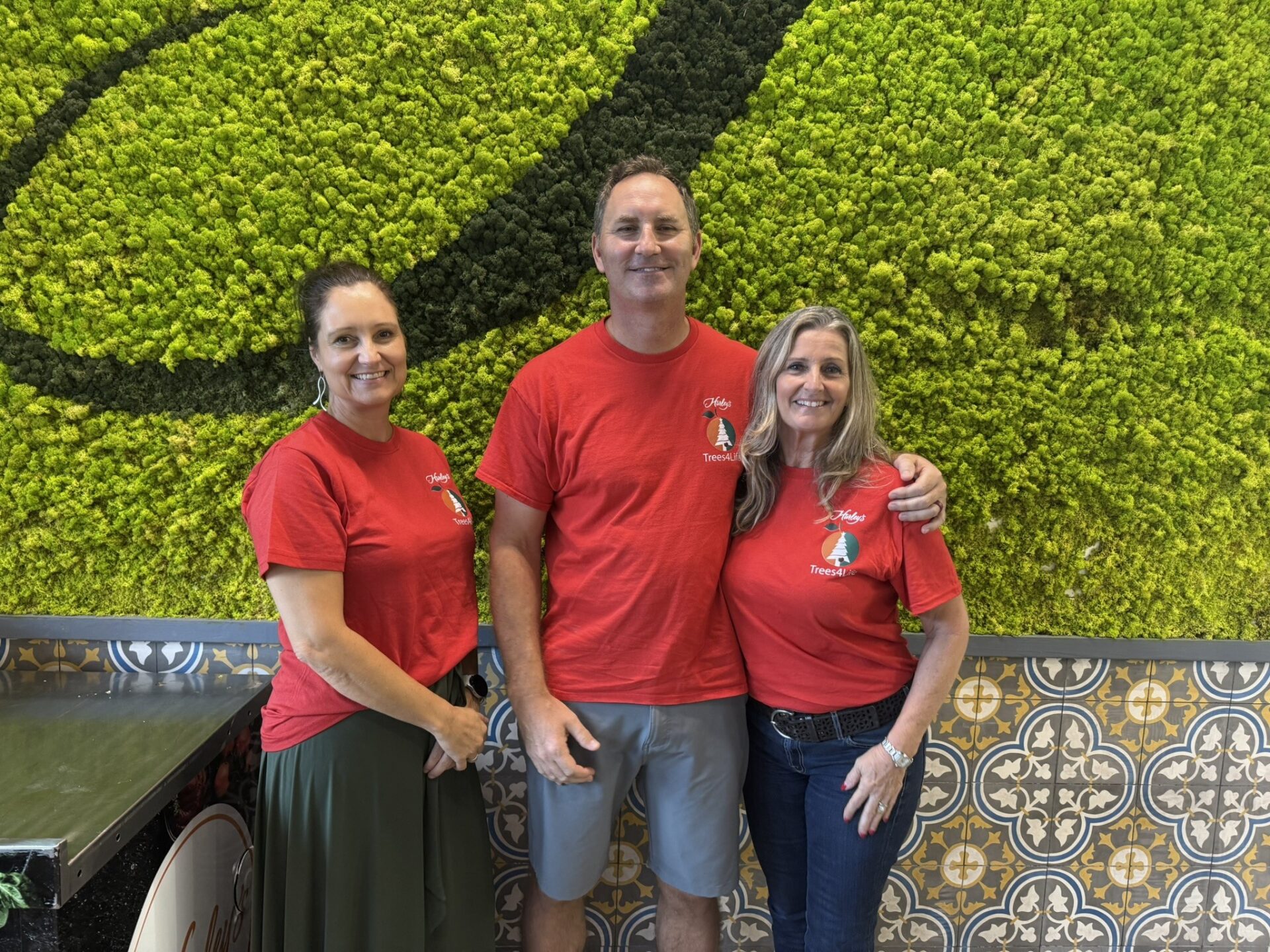 Jeff and Kelly Mcglashan with Deidre Redfern from Hurley's supermarket