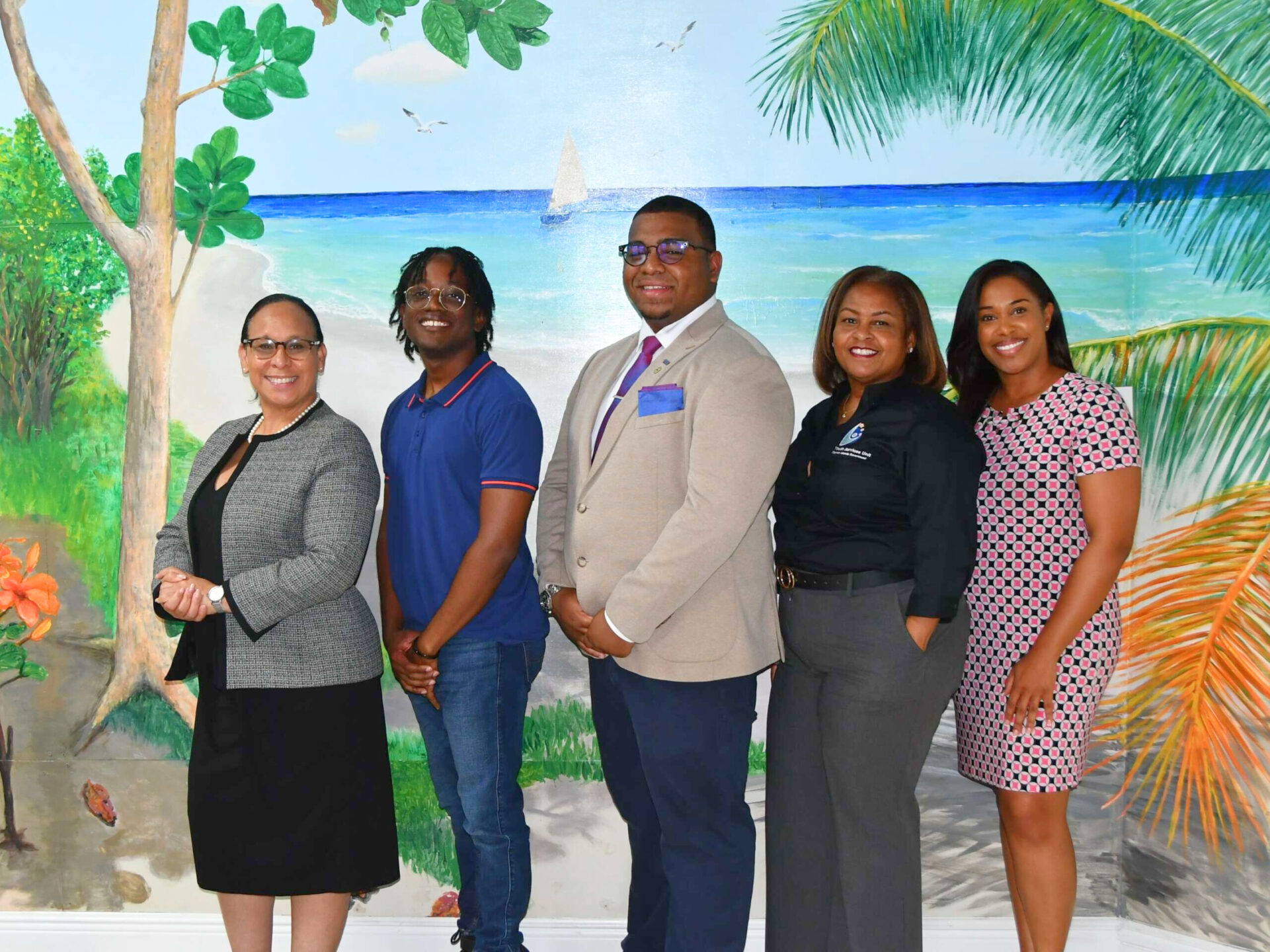 From left, Chief Officer for Ministry of Youth, Sports & Heritage Teresa Echenique, Alternate Male CYA Diarra Hoyte, Male CYA D'Vonte Joseph, Head of Youth Services Unit Mellony Bryan-Waugh and Acting Assistant Chief Officer Melissa Whorms pictured at the Intergenerational Hub (offices for the Youth Services Unit). - Photo: Cayman Islands Government