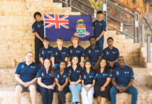 Cayman Islands robotics team set to compete on global stage again The Cayman Islands National Robotics Team with its mentors. - Photo: Supplied