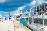 Cruise ships bypass Grand Cayman to avoid Hurricane Melissa Cruise passengers coming off a tender