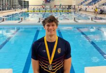 Danny Kish sets new Cayman swimming record