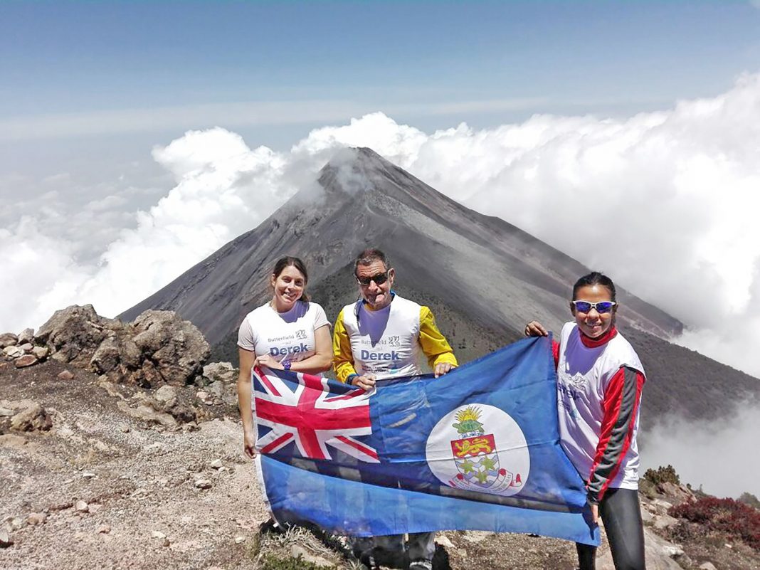 Veteran climber Derek Haines at the summit of Acatenango 