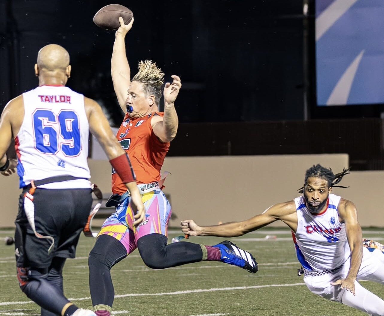 Deandre Simpson makes a tackle for the Cayman Men’s Team. flag football
