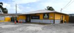 Police search for suspect in bar stabbing